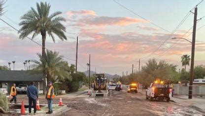 Tempe streets closed after water main break .